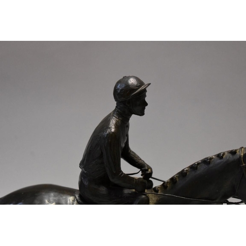 1602 - A Minerva Fine Arts bronzed resin horse and jockey figure group, inscribed 'Ista', dated 1978 and nu... 