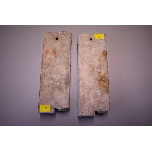 1609 - A pair of Chinese famille rose wall pockets, each in the form of a tied scroll, 23cm long.... 