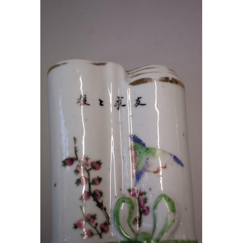 1609 - A pair of Chinese famille rose wall pockets, each in the form of a tied scroll, 23cm long.... 