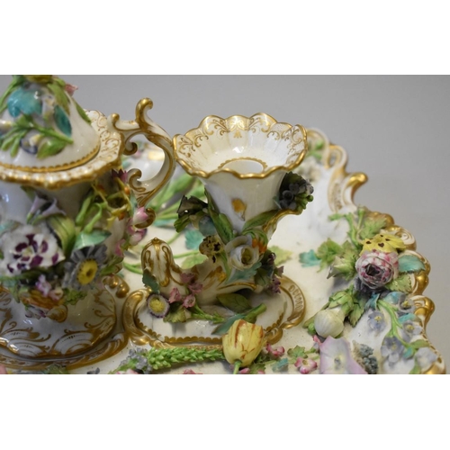 1610 - A 19th century English porcelain floral encrusted desk stand, probably Coalbrookdale, 34cm wide, (s.... 