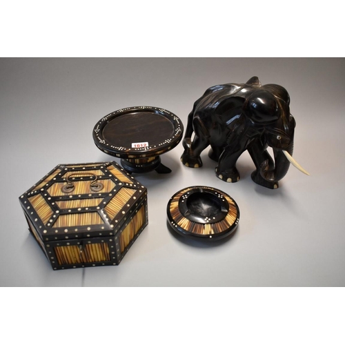 1612 - Three Ceylonese ebony and porcupine quill items, to include: a hexagonal casket, 21cm wide; together... 