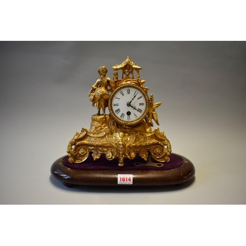 1614 - A late 19th century Continental gilt spelter mantel time piece, 26.5cm high, on wood stand, with ass... 