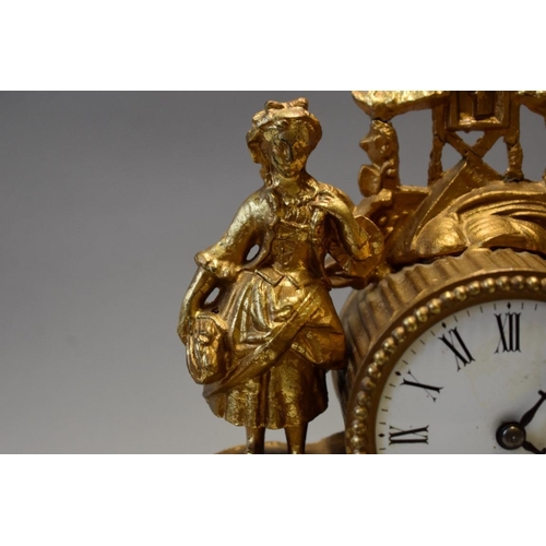 1614 - A late 19th century Continental gilt spelter mantel time piece, 26.5cm high, on wood stand, with ass... 