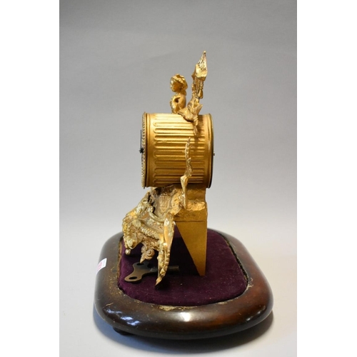 1614 - A late 19th century Continental gilt spelter mantel time piece, 26.5cm high, on wood stand, with ass... 