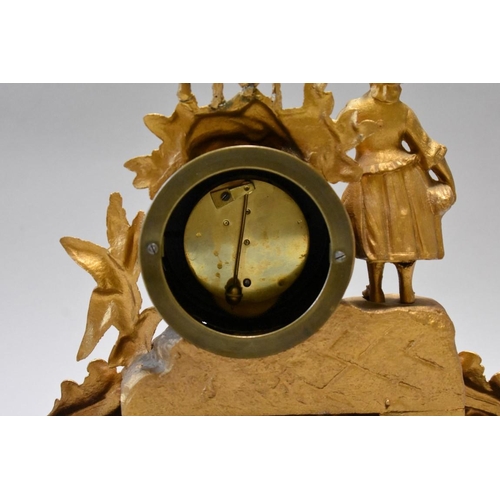 1614 - A late 19th century Continental gilt spelter mantel time piece, 26.5cm high, on wood stand, with ass... 