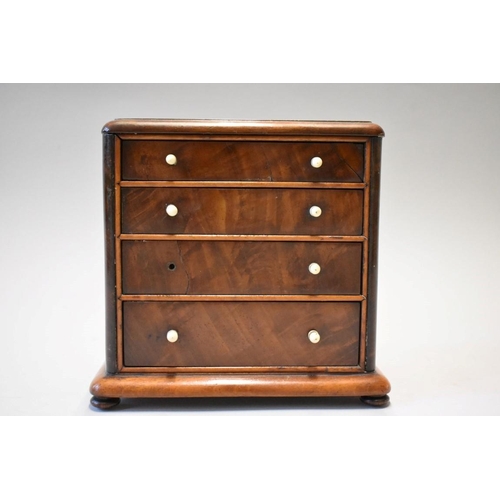 1628 - A good 19th century miniature mahogany chest of drawers, 17cm high x 18cm wide x 9.5cm deep.... 