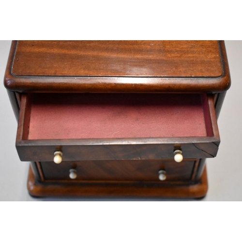 1628 - A good 19th century miniature mahogany chest of drawers, 17cm high x 18cm wide x 9.5cm deep.... 