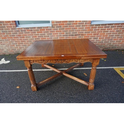 1187 - A good carved oak dining suite, comprising: a draw leaf table, 213cm extended; six dining chairs, to... 