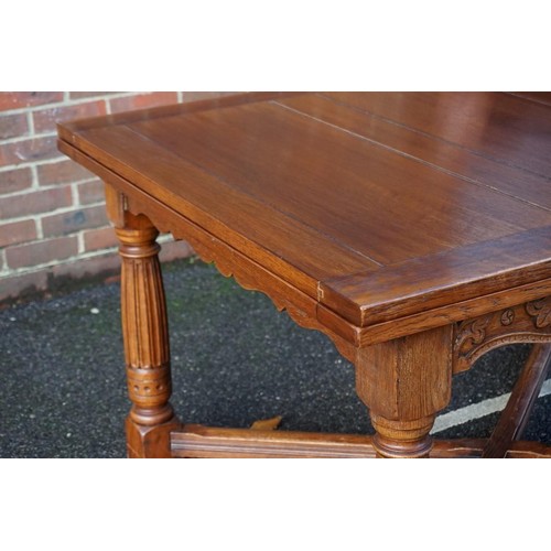 1187 - A good carved oak dining suite, comprising: a draw leaf table, 213cm extended; six dining chairs, to... 