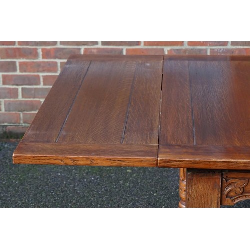 1187 - A good carved oak dining suite, comprising: a draw leaf table, 213cm extended; six dining chairs, to... 