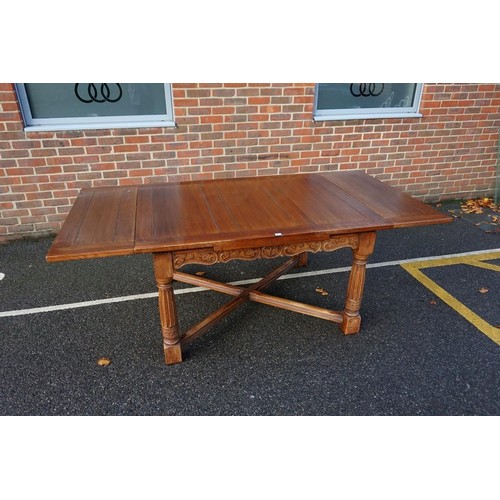 1187 - A good carved oak dining suite, comprising: a draw leaf table, 213cm extended; six dining chairs, to... 