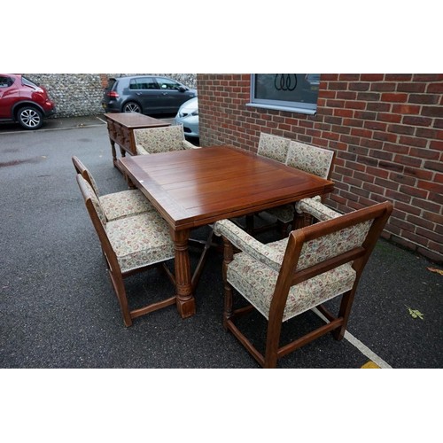 1187 - A good carved oak dining suite, comprising: a draw leaf table, 213cm extended; six dining chairs, to... 