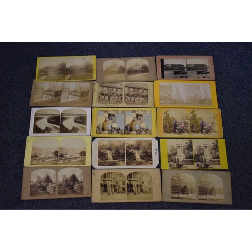 163 - A BOX, to include: 34 stereocards, approx 70 misc. photographs and an old school atlas. (Small ... 