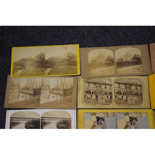 163 - A BOX, to include: 34 stereocards, approx 70 misc. photographs and an old school atlas. (Small ... 