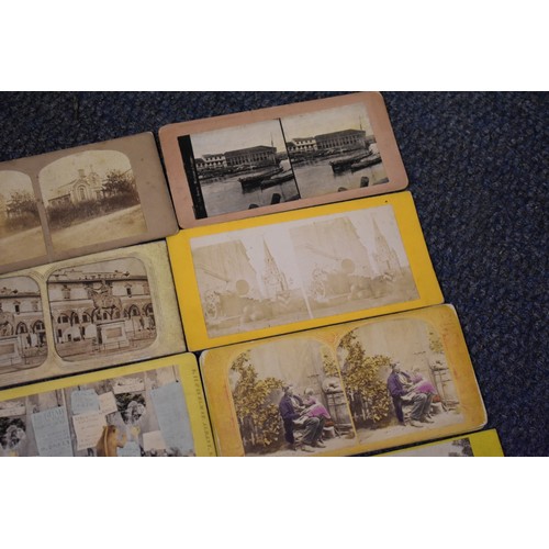 163 - A BOX, to include: 34 stereocards, approx 70 misc. photographs and an old school atlas. (Small ... 