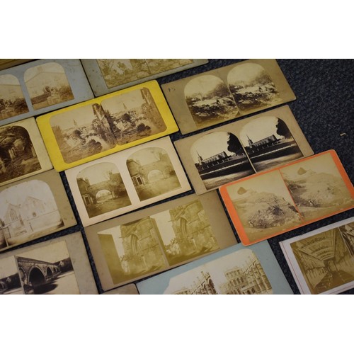 163 - A BOX, to include: 34 stereocards, approx 70 misc. photographs and an old school atlas. (Small ... 