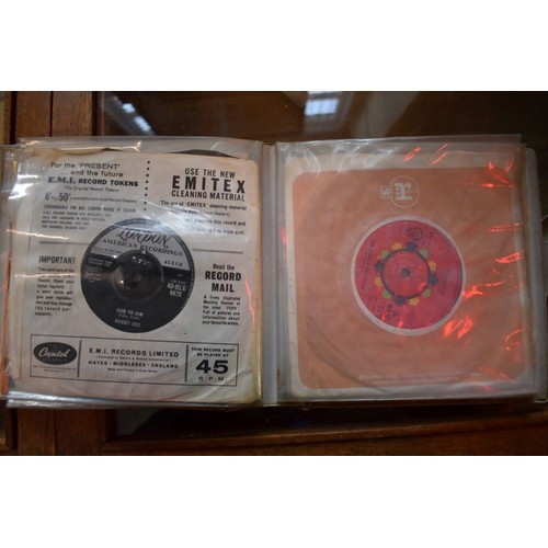 1231 - Vinyl Records: an interesting collection, comprising: seventy 33rmp albums and twelve 45rpm singles,... 