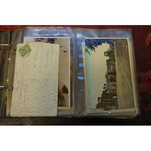 118 - POSTCARDS: misc collection of approx 212 postcards, chiefly topographical, contained in two modern a... 