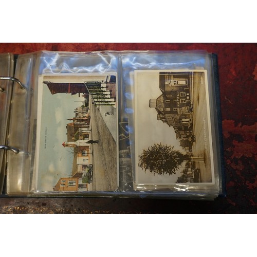 118 - POSTCARDS: misc collection of approx 212 postcards, chiefly topographical, contained in two modern a... 