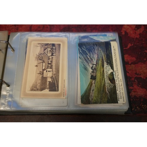 118 - POSTCARDS: misc collection of approx 212 postcards, chiefly topographical, contained in two modern a... 