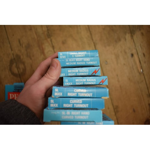 582 - A large quantity of Peco 'OO' gauge track, of various length, some boxed. (qty)