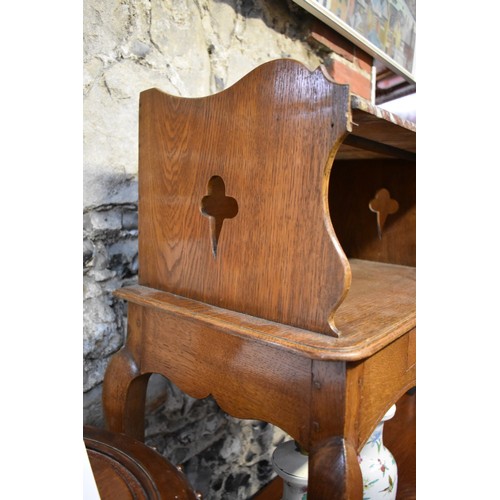 1184 - A pair of Continental oak and marble top bedside tables, 53.5cm wide.