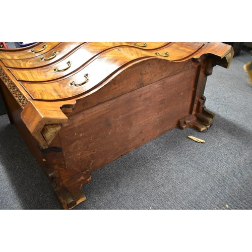 1458 - A good George III figured mahogany serpentine fronted chest of drawers, the frieze drawer with a bru... 