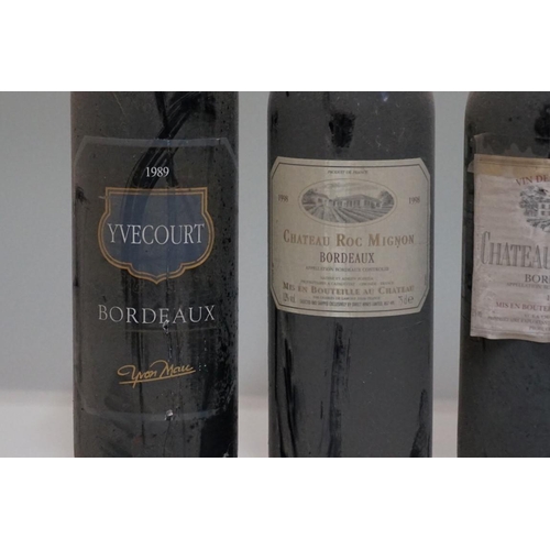 63 - Four 75cl bottles of Bordeaux, comprising: Chateau Lafosse, 1990; Chateau Roc Mignon, 1998; Chateau ... 