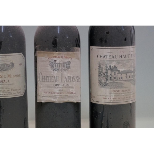 63 - Four 75cl bottles of Bordeaux, comprising: Chateau Lafosse, 1990; Chateau Roc Mignon, 1998; Chateau ... 