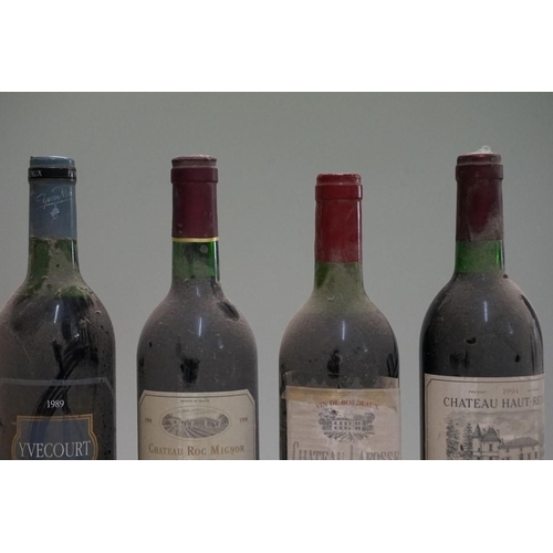 63 - Four 75cl bottles of Bordeaux, comprising: Chateau Lafosse, 1990; Chateau Roc Mignon, 1998; Chateau ... 