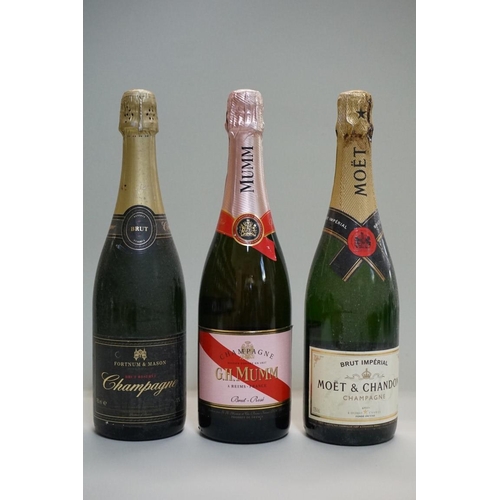 75 - Three 75cl bottles of NV champagne, comprising: G H Mumm brut rose; Moet & Chandon brut imperial... 