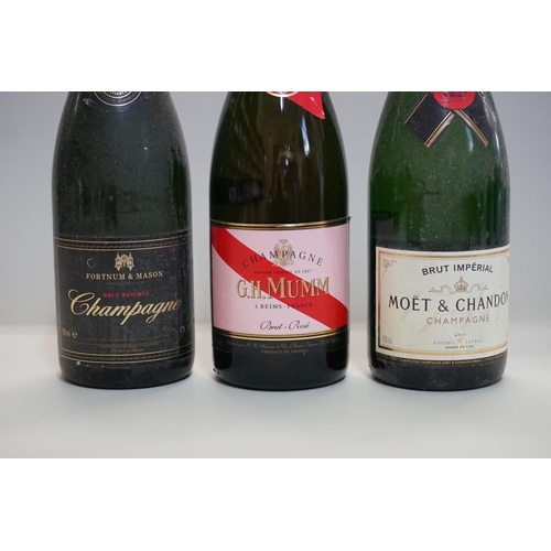 75 - Three 75cl bottles of NV champagne, comprising: G H Mumm brut rose; Moet & Chandon brut imperial... 