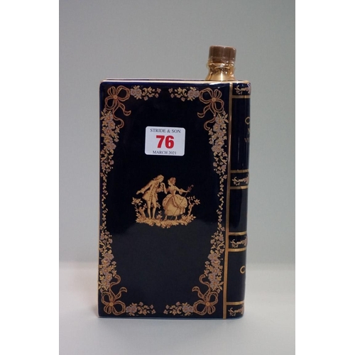 76 - A bottle of Camus Napoleon vieille reserve cognac, in Limoges porcelain novelty book form decanter, ... 