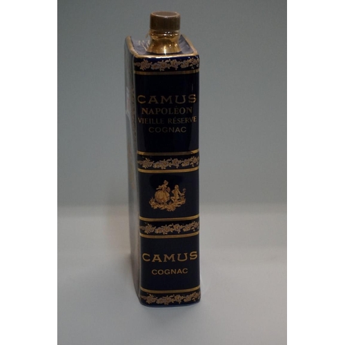 76 - A bottle of Camus Napoleon vieille reserve cognac, in Limoges porcelain novelty book form decanter, ... 