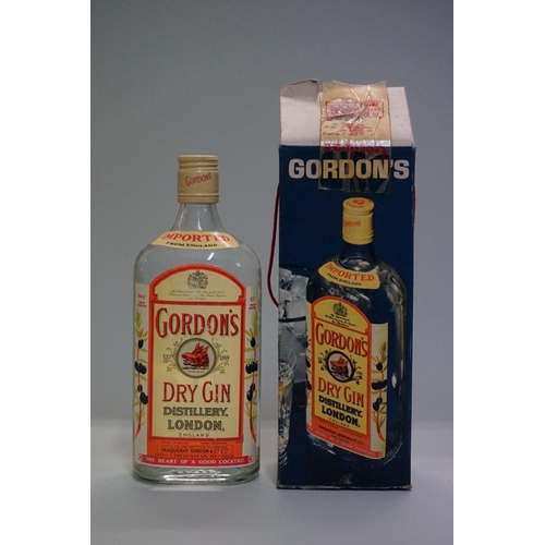 91 - A 26.6 fl.oz. bottle of Gordon's dry gin, 1960s bottling, in card box.