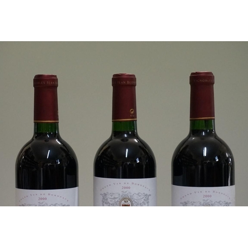 94 - Three 75cl bottles of Chateau Hauchat La Rose, 2000, Fronsac. (3)