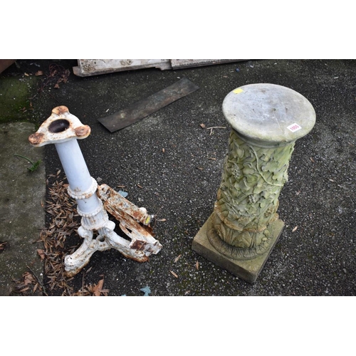 1055 - A reconstituted stone pillar; together with a cast iron table base and two brackets.Collection of th... 