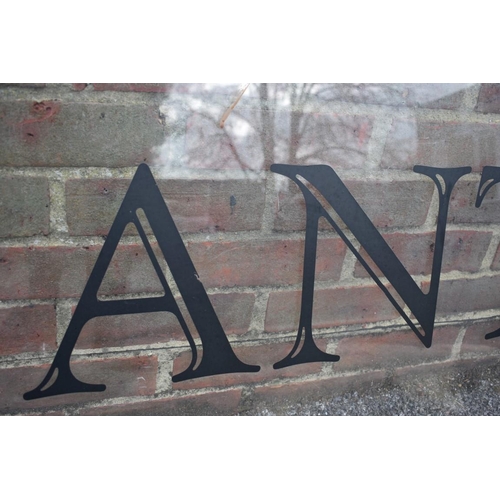 1064 - An acrylic 'Antiques' display sign, 188.5cm wide x 56cm high.Collection of this lot is strictly by a... 