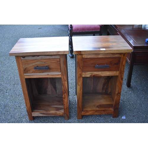 1074 - A pair of hardwood bedside chests, 40cm wide x 30cm deep x 65.5cm high.Collection of this lot is str... 