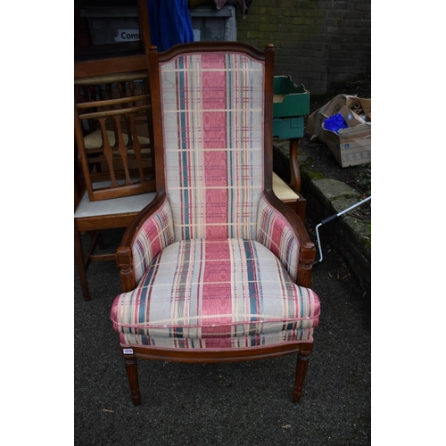 1076 - A reproduction armchair, 115cm high x 65cm wide.Collection of this lot is strictly by appointment on... 