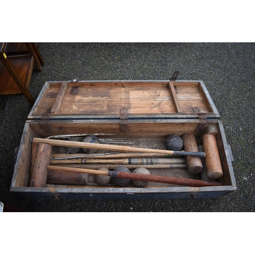 1080 - An old croquet set in wooden box.Collection of this lot is strictly by appointment on Saturday 13th ... 