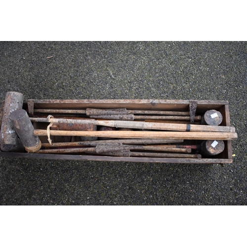 1081 - An old croquet set in wooden box, (missing lid).Collection of this lot is strictly by appointment on... 