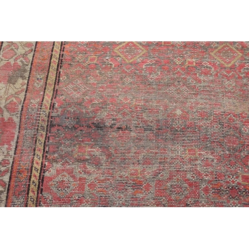 1090a - A Persian runner, having geometric decoration to central field with floral borders, 405 x 100cm.... 