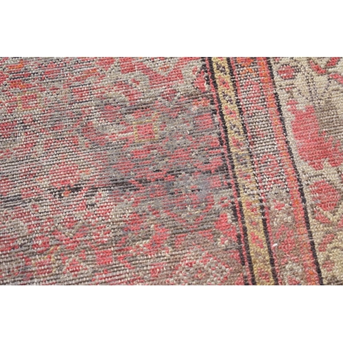 1090a - A Persian runner, having geometric decoration to central field with floral borders, 405 x 100cm.... 