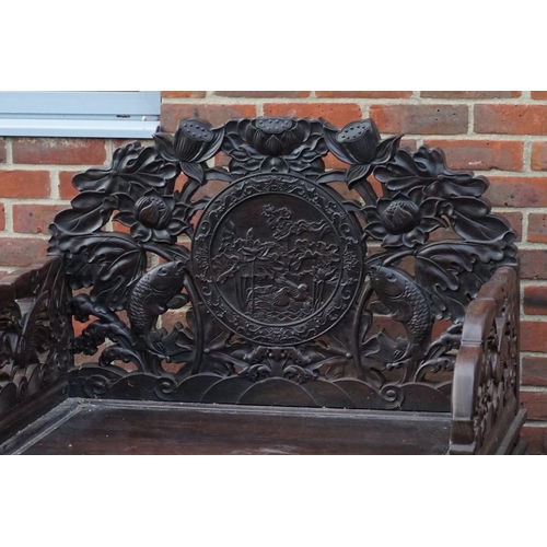 1686 - A large pair of Chinese carved and pierced hardwood Imperial throne chairs and matching table, proba... 