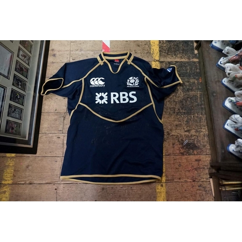 1073 - Rugby Union:a framed display of Gavin Hastings ephemera, the whole 57 x 77cm; together with a relate... 