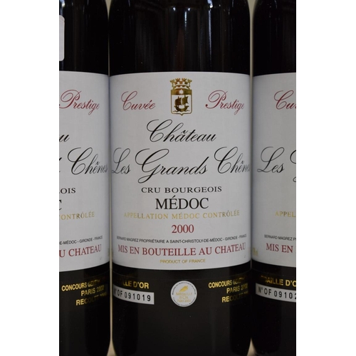 560 - Three 75cl bottles of Chateau Les Grands Chenes Cuvee Prestige, 2000, Bernard Magrez. (3)... 