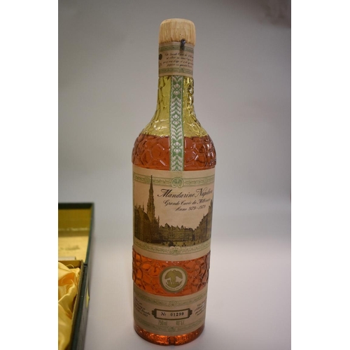 617 - A 75cl bottle of Mandarine Napoleon liqueur, bottle no.01299, with certificate, in presentation styl... 