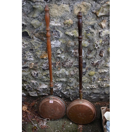 1059 - Two old copper warming pans.