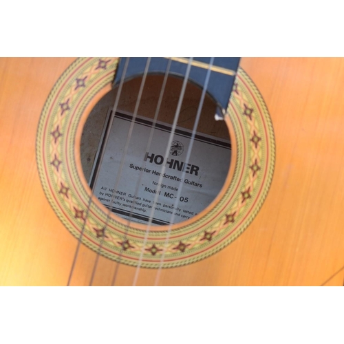 1070 - Three acoustic guitars. 